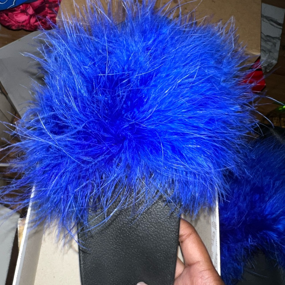 blue boutique made fur slides
